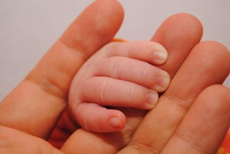 Mother & baby hand
